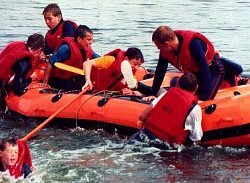 river hiking fully clothed